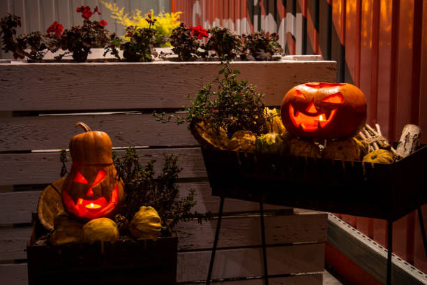 istock Halloween pumpkins with carved demonic faces 1301381752