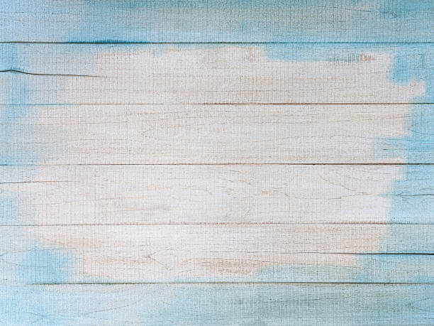 istock Distressed, worn, weathered, old, blue and white, wooden panel abstract background. 1301382941