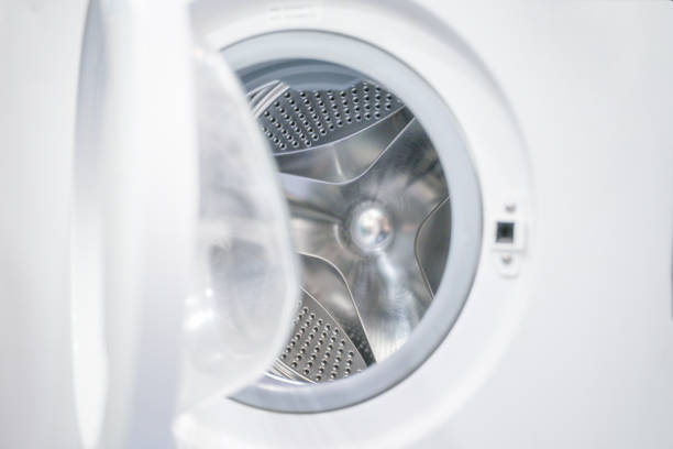istock open door of an empty washing machine close up 1301383043