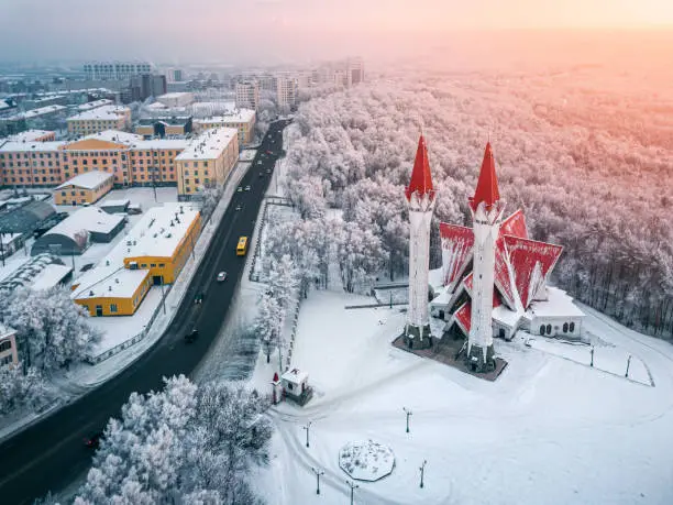 Photo of Aerial drone view of the famous landmark of Ufa and Bashkiria - Lala Tulip mosque during sunset in winter season. Islamic religion and muslim culture in Russia concept