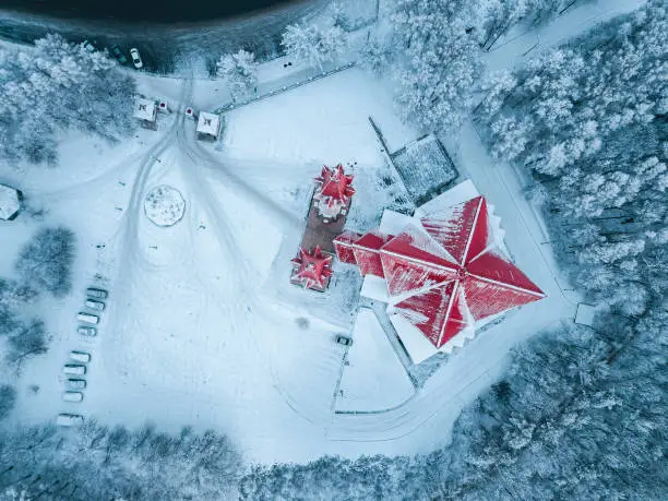 Photo of Aerial top point of view of the famous landmark of Ufa city and Bashkortostan - Lala Tulip mosque during sunset in winter season. Islamic religion and muslim culture in Russia concept