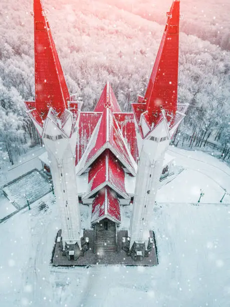 Photo of Aerial drone view of the famous landmark of Ufa and Bashkortostan - Lala Tulpan mosque during sunset in winter season. Islamic religion and muslim worship in Russia concept