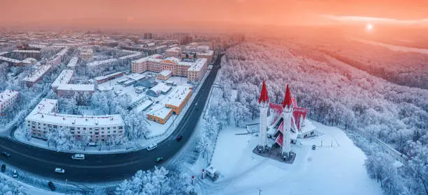 Photo of Aerial drone view of the famous landmark of Ufa and Bashkiria - Lala Tulip mosque during sunset in winter season. Islamic religion and muslim culture in Russia concept