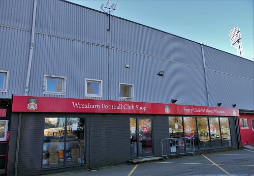 Wrexham AFC Club Shop the morning after the news broke that Ryan Reynolds & Rob McElhenney had become The New Owners of Wrexham Fc in North Wales. The Hollywood Stars have bought the National League Club & Invested £2million in the club - The 3rd Oldest Football Club in The World & The Racecourse Ground is The Oldest International Football Ground In The World that is still in use\nPhoto Taken in Wrexham North Wales UK February 10th 2021