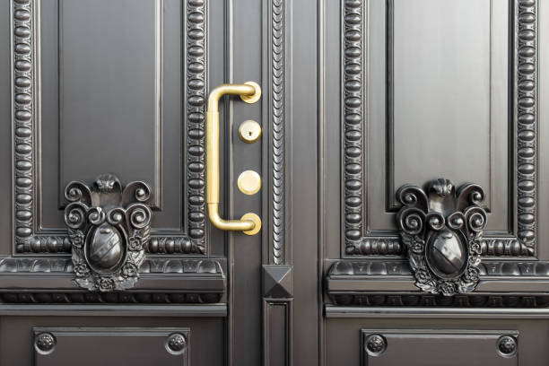 istock Vintage entrance door with golden handle 1301394480
