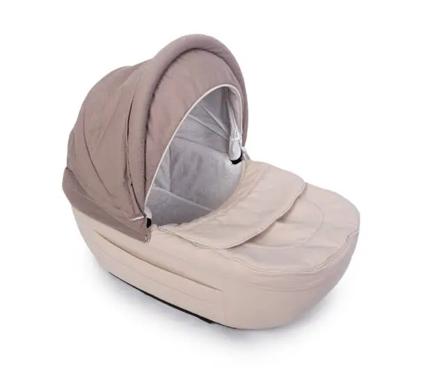 Beige carrycot stroller isolated over white background