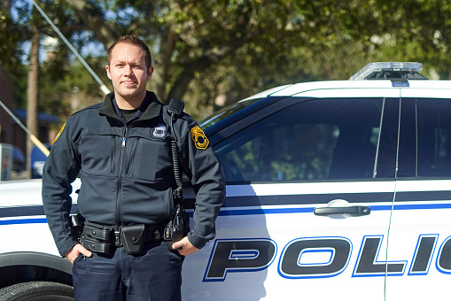 Cropped portrait of a handsome young policeman out on patrol