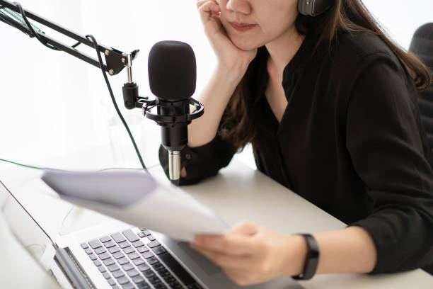 istock Asian woman making a live broadcast or podcast 1301400238