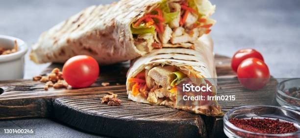Eastern Traditional Shawarma With Sauces Stock Photo - Download Image Now - Wrapping Paper, Chicken Meat, Dürüm