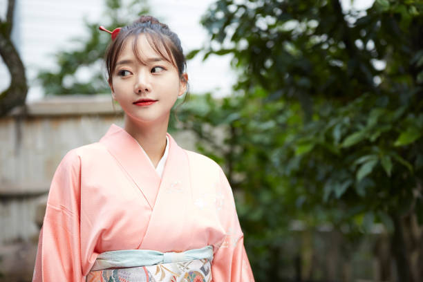 istock A young woman in a kimono is walking around 1301400426