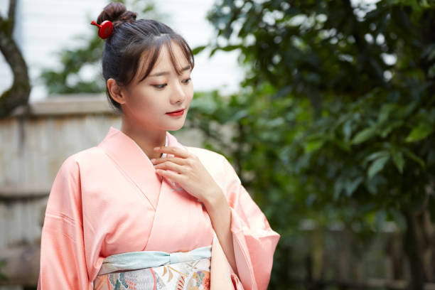 istock A young woman in a kimono is walking around 1301400451