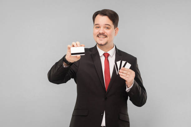 istock Happiness business man holding many cards 1301400465