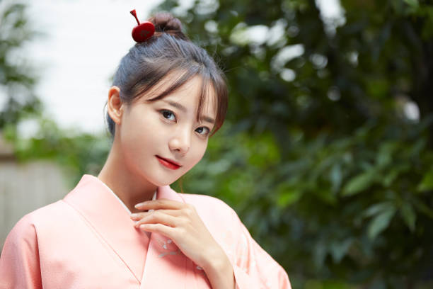 istock A young woman in a kimono is walking around 1301401080