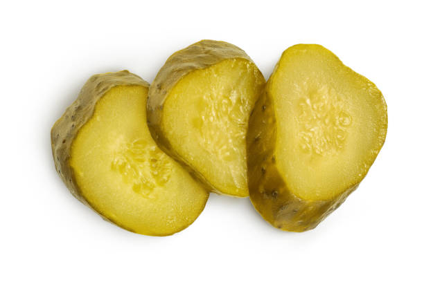 istock Marinated pickled cucumber slices isolated on white background with clipping path and full depth of field. Top view. Flat lay 1301408348