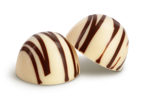 istock white chocolate candy isolated on white background with clipping path and full depth of field 1301408422