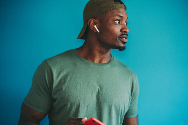 istock Young man listening to music 1301408461