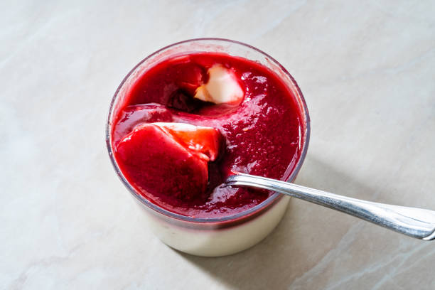 istock Delicious Italian Dessert Raspberry Panna Cotta with Berry Sauce. 1301410963