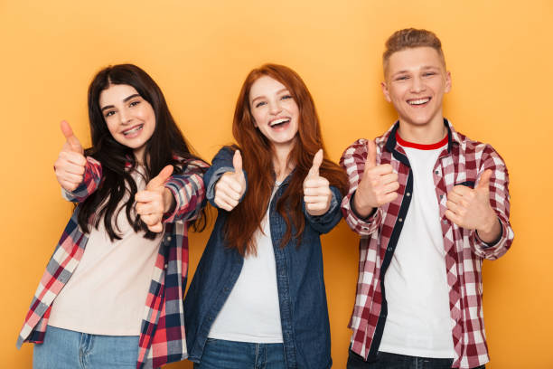 istock Group of cheerful school friends 1301414216