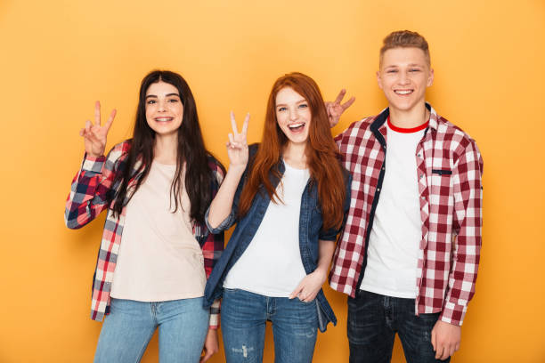 istock Group of happy school friends 1301414455