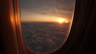 istock View from plane window sunshine clouds 1301414901