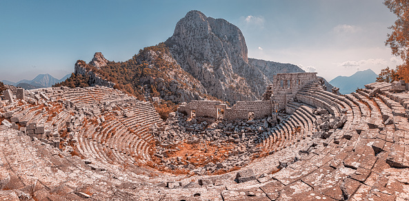 Panoramic view of amphitheater in the ancient city of Termessos is one of the main tourist and archaeological attractions of the Antalya region and the whole of Turkey.