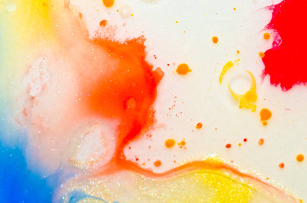 istock liquid bright aquarel colours with oil generate fluid structures and bubbles in red, orange, yellow, blue, white and pink 1301415823