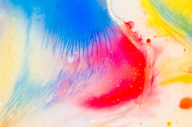 istock liquid bright aquarel colours with oil generate fluid structures and bubbles in red, orange, yellow, blue, white and pink 1301415862