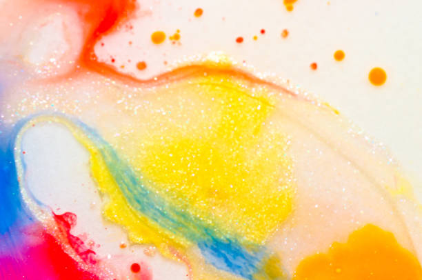 istock liquid bright aquarel colours with oil generate fluid structures and bubbles in red, orange, yellow, blue, white and pink 1301415866