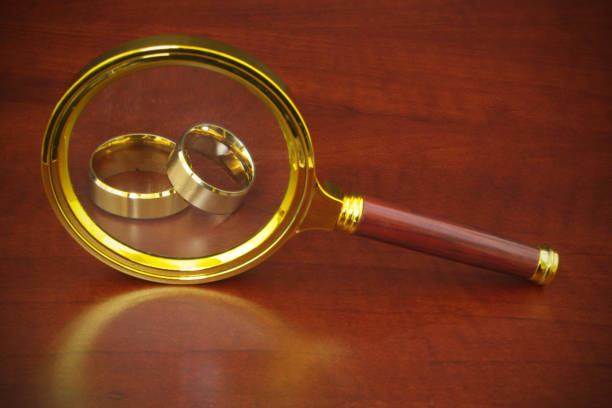 Magnifying glass, directly above.
