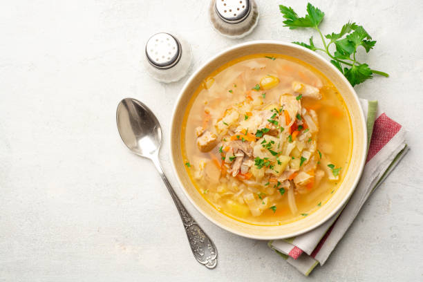 istock Traditional Russian cabbage soup Shchi on concrete background 1301421746