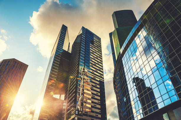 istock Modern glass skyscrapers against the sky at sunset. 1301421880