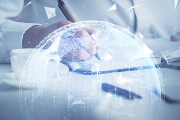 istock Double exposure of hands and notepad with business icons. 1301422904