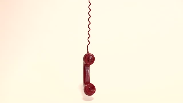 Old red telephone handset
