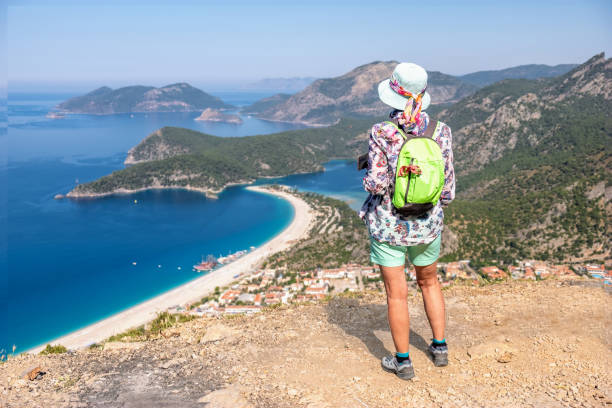 istock Tourist on the observation deck overlooking Oludeniz 1301425223