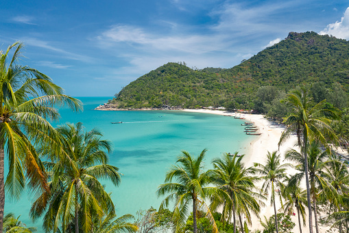 Aerial of the beautiful secluded Bottle Beach in the North of the famous Island Koh Phangan, Thailand. Converted from RAW.