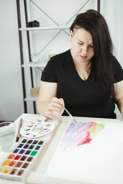 istock Illustrator, artist or designer at work in studio 1301430491