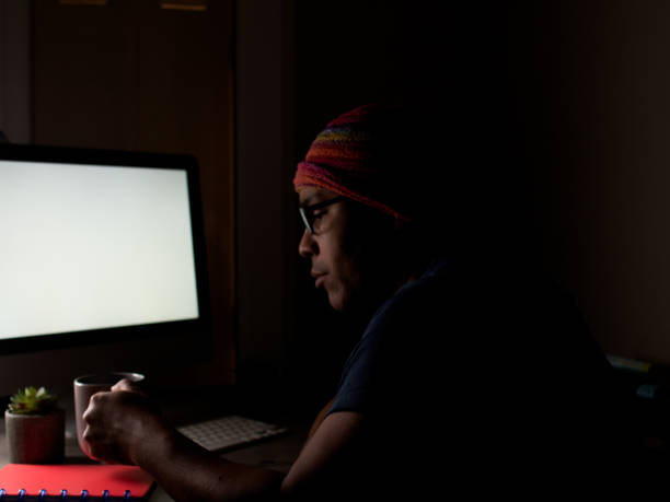 istock Freelancer working remotely from home overnight during pandemic 1301430695