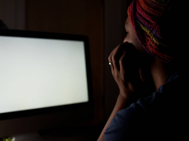 istock Freelancer working remotely from home overnight during pandemic 1301430741