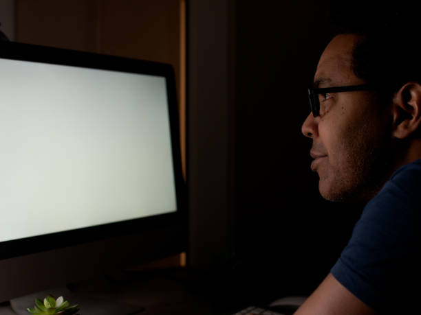 istock Freelancer working remotely from home overnight during pandemic 1301430794