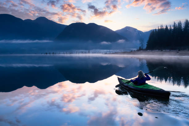 istock Adventurous Girl kayaking on an infatable kayak 1301431007