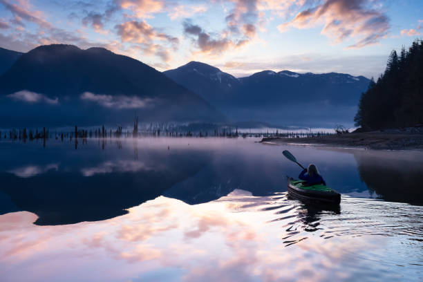 istock Adventurous Girl kayaking on an infatable kayak 1301431039