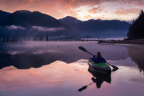 istock Adventurous Girl kayaking on an infatable kayak 1301431048
