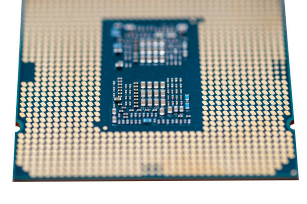 istock A macro photo of a modern CPU processor under the LGA 1200 socket on a green circuit board, isolated on a white background. 1301431126