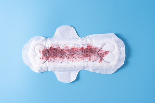 Used Sanitary Pad Sanitary Napkin On Blue Background Menstruation Feminine  Hygiene Top View Stock Photo - Download Image Now - iStock