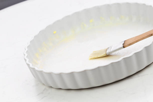 istock Apple pie with fanned apple in porcelain baking pan image series 06 1301436469