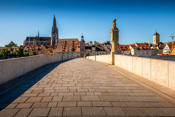 Regensburg, Germany - August 21, 2020: Historic City Regensburg / Germany. View from Steinerne Bruecke to the very famous historic city center of Regensburg. It is part of the UNESCO World Heritage.