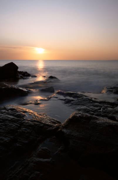 istock the sunset colors in the horizon 1301436655
