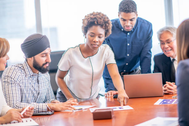 istock Diverse group of businesspeople collaborating 1301438373