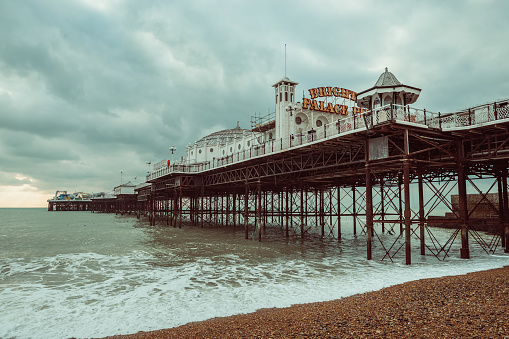 Brighton, United Kingdom - December 14, 2018: Brighton Palace Pier and Brighton Beach, United Kingdom