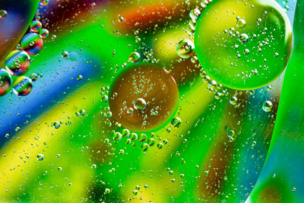 istock oil drops on water on a multicolored background 1301440940